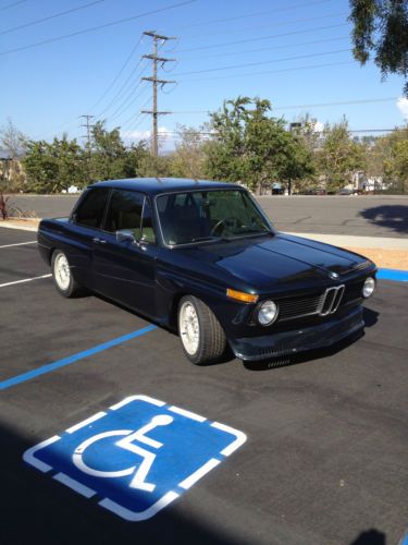 2002 tii with zender box flairs and spoiler.  &#039;73  5 speed trans