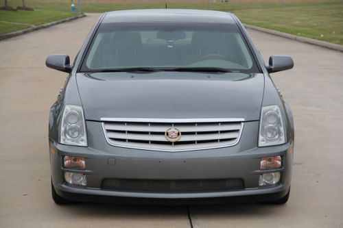 2005 cadillac sts,rust free,tx title,below wholesale,week special