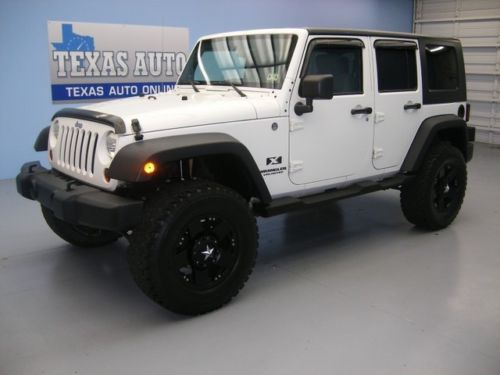 We finance!! 2009 jeep wrangler unlimited x 4x4 hard top lifted texas auto