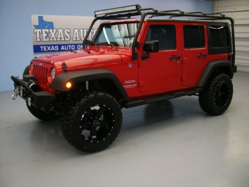 We finance! 2012 jeep wrangler unlimited sport hardtop led bar lifted texas auto