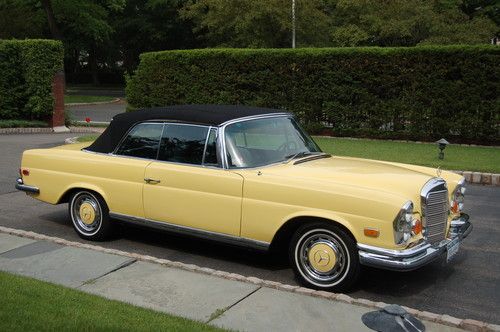 Yellow mercedes convertible