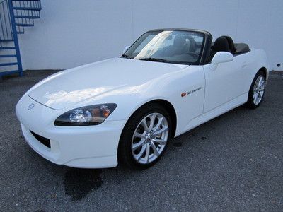 White, black power convertible top, black &amp; red leather, 6 speed manual