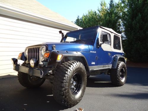 2000 jeep tj low miles 2.5 liter 5 speed lifted on 35s 60/40 lockers low miles