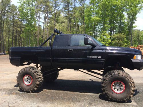 Lifted dodge ram, nitrious,supercharged,4 linked race ready
