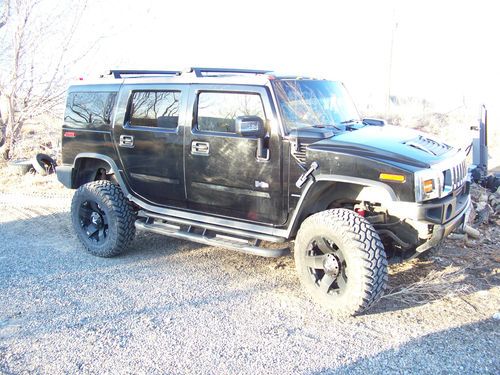 Hummer h2 2006 black with 4 inch lift and extras