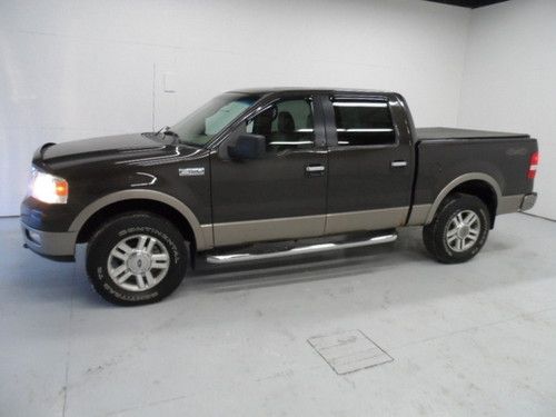 We finance! lariat 4wd 4x4 v8 leather supercrew brown clean carfax