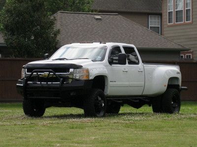 Crew cab dually ( leather ) twin turbo! lifted