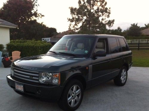 2005 range rover hse 40,600 miles, tonga green, white leather, garage kept