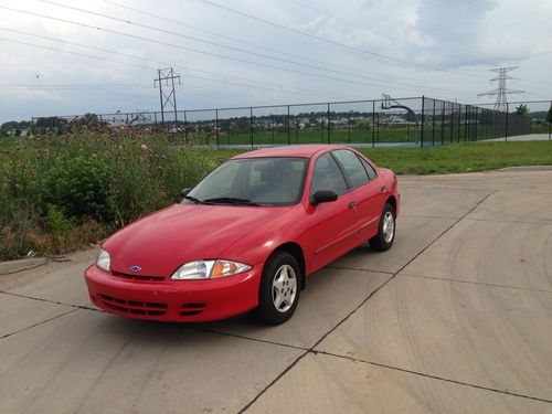 2001 chevy cavalier, red, 4-cyl, 4-door- 2 owners well maintained.