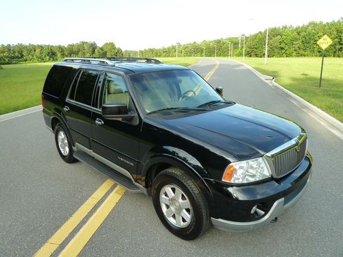 2004 lincoln navigator luxury clean carfax xenons quad seating 3rd row  seat !!!
