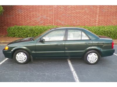 Mazda protege dx southern owned gas saver est 30 hwy mpg cd player no reserve