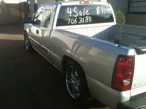 2003 chevy silverado xcab.  silver in color with grey interior.  in great shape.