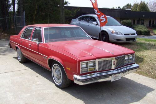 Solid-org-bright-red-paint-6.6l-403-4bbl-ac-loaded-cutlass-delta-88-sis-project