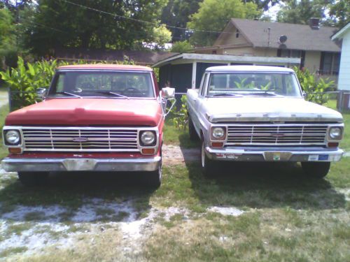 2 ford trucks, white 3 on tree, red 3 on the floor