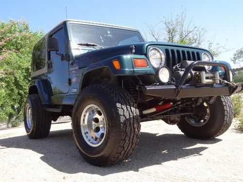 No reserve 1999 jeep wrangler sahara 4.0 liter lifted hardtop warn winch