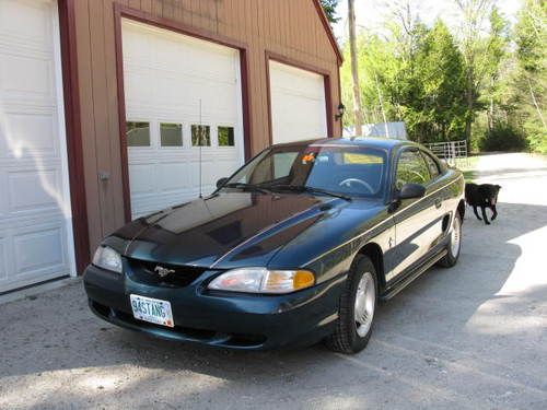 1994 ford mustang green    5 speed   low miles