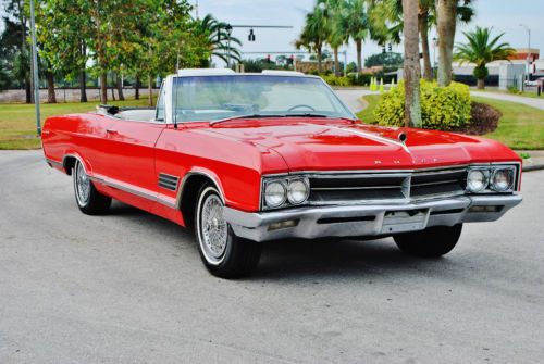 Simply beautiful loaded 1966 buick wildcat convertible nailhead a/c red/white.