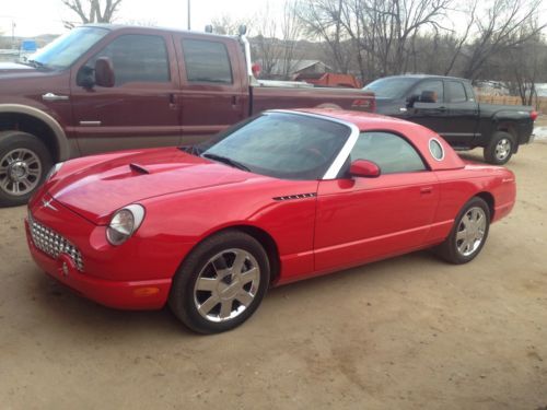 2002 ford thunderbird base convertible 2-door 3.9l red/black 27,000 miles. mint