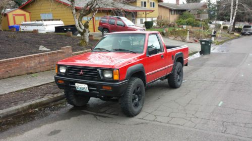 1993 4x4 mitsubishi mighty max pick up. lift. ta&#039;s fi.2.4 four cylinder rare.