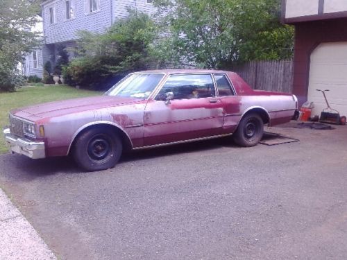 1980 red, chevrolet impala 2dr runs,  as is