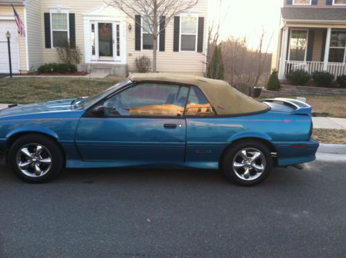 Teal blue chevy cavalier convertible needs some work currently driving