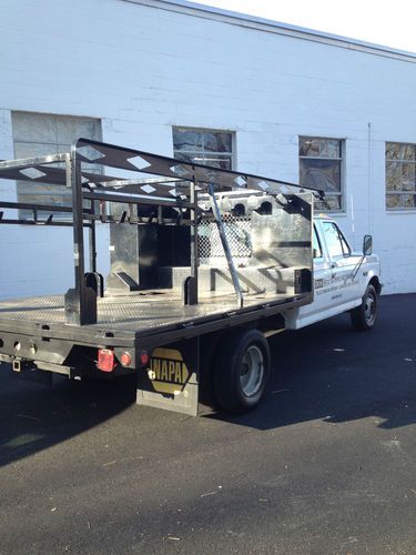 Ford f-350 crew cab, rack body ready to work, great running condition. no rust