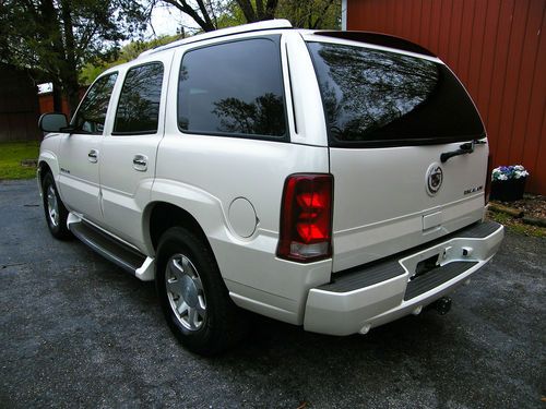 Loaded pearl white escalade luxury sport utility vehicle