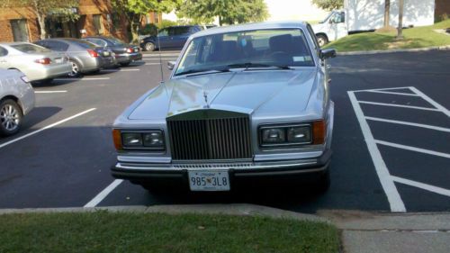 1982 rolls-royce silver spur.  silver with dark blue interior