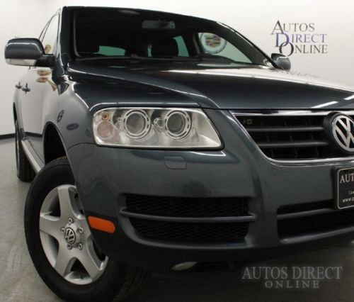 We finance 04 touareg v6 4wd clean carfax cd audio xenons heated seats low miles