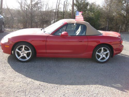 2002 mazda miata mx5 auto leather low miles nardi eddition..red with tan top.