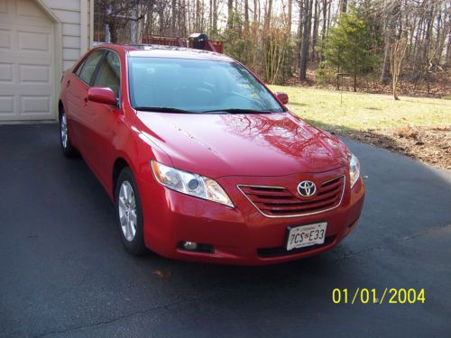 6 cyl, 54,000 miles, loaded, red with tan interior, nav, sunroof, premium stereo