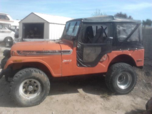 Classic jeep with only 33,000 original miles has a v-8 304  red motor