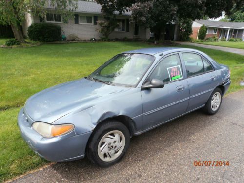 Light blue, good running, great gas mileage ford escort. repairs documented.