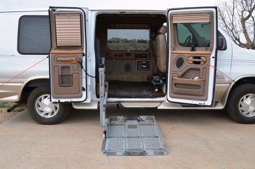 Beautiful ford van, choochoo custom, handicapped wheelchair accessible with lift