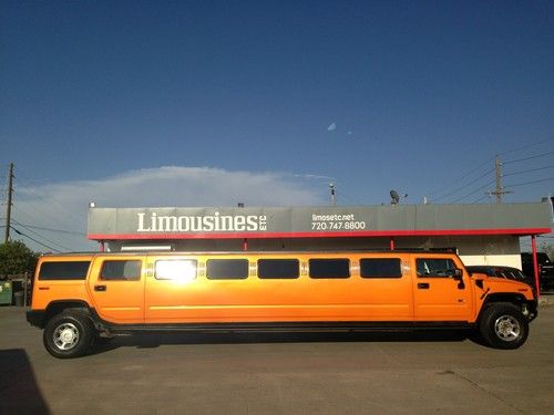 H2 hummer limousine. 24 passenger. metallic orange. call 720-329-4349