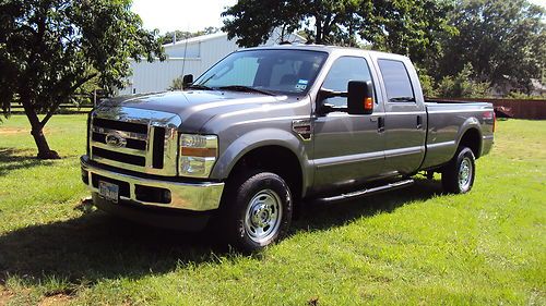 2010 ford f350 xlt fx4 -crew cab 6.4l diesel - long bed 8ft - 1 owner -55 photos
