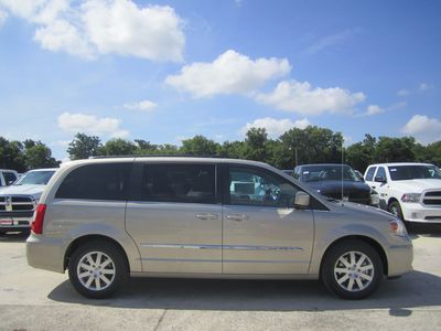 Brand new sleek champagne 2013 chrysler town &amp; country touring