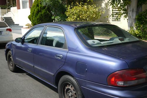 1999 mazda 626 lx sedan 4-door 2.0l