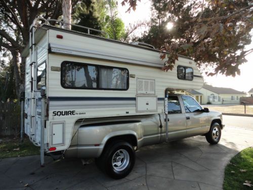 With 1987 lance squire camper