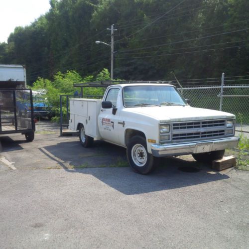 1986 chevrolet c20 work truck with rack and boxes