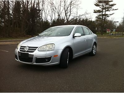 6 speed manual navigation 6 disc cd changer heated seats sun roof lether seats