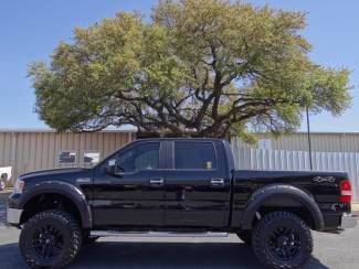 Lifted black larat 5.4l v8 4x4 sun roof leather we finance we want your trade