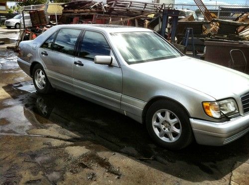 Silver, great condition, new trans, two owners, garaged,  4 door