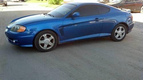 2004 hyundai tiburon 2.0l 4cyl new motor and transmission with only 66k miles