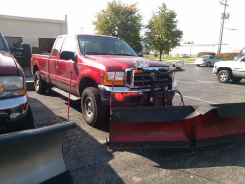 2001 f250 4x4 super cab xlt with snow plow and salt spreader