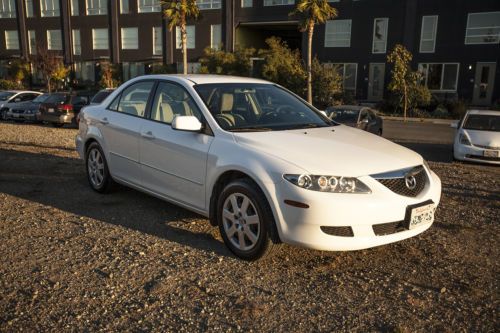 Gently used 2005 white mazda 6 i. clean title, carfax, low miles.