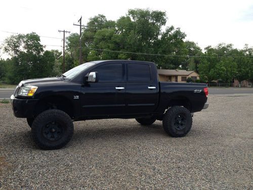 Sell used LIFTED BLACK ON BLACK NISSAN TITAN in Grand ...