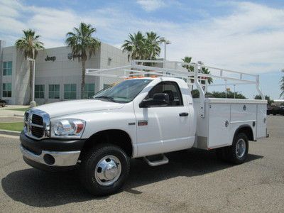 2007 white automatic miles:16k regular cab work truck with rack and bins
