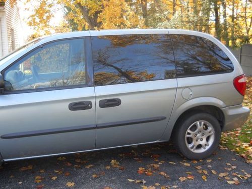 Light blue dodge caravan