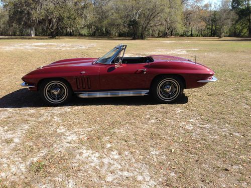 65 corvette convertable 327/365hp,  maroon, white top, knock offs, side pipes
